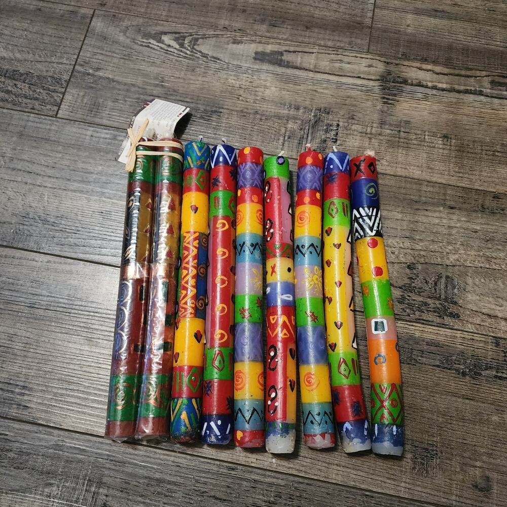 9 decorative 10 inch candles all sides decorated J